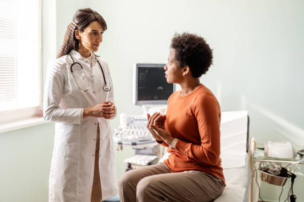 Clinician listening attentively to a patient during an unhurried consultation